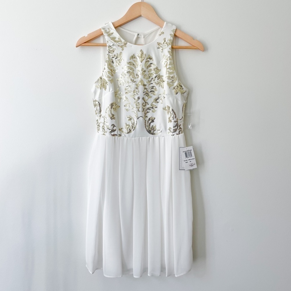 B. Darlin white chiffon dress with gold sequins. NWT. Size 5/6.
